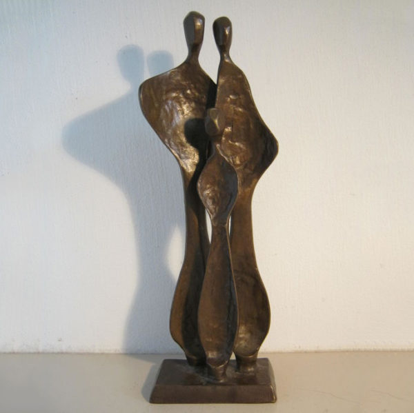 Bronze sculpture of abstract figures in the room