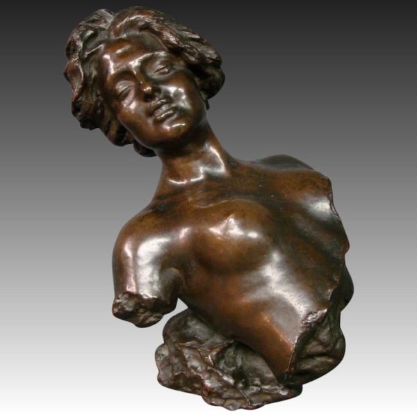 Decorated outdoors partially nude girl bronze statue