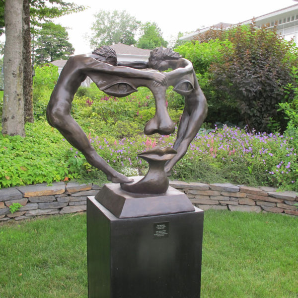 Bronze sculptures of abstract human faces