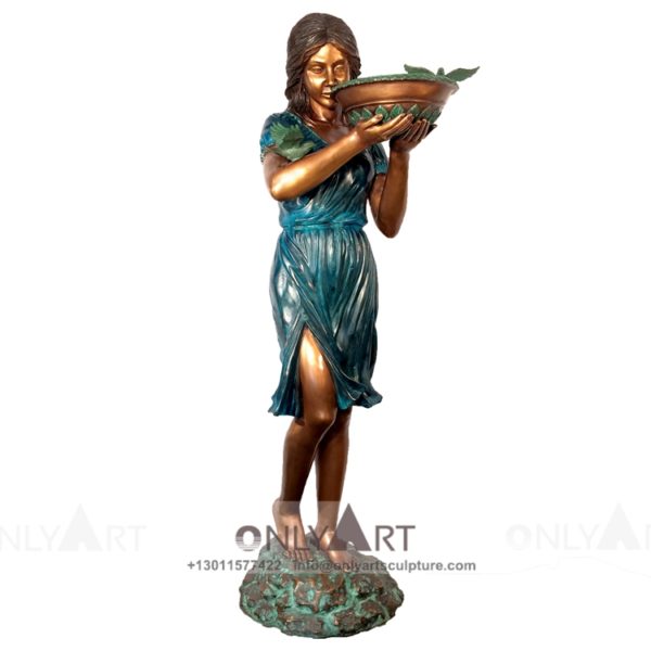 A fountain sculpture of a bronze maiden holding a pot adorns the garden